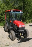 Model specific KHP air-conditioning installed in a Yanmar real estate tractor.